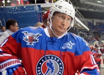 putin playing ice hockey AAP