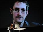 Mr Snowden is interviewed via video link at the New Yorker Festival in 2014.