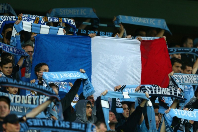 Sydney FC fans display the French flag at the A-League game against Melbourne victory. Photo: Getty