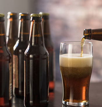 Brewing your own beer equates to about $12 per carton. Photo: Getty