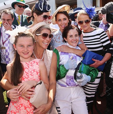 MELBOURNE, AUSTRALIA - NOVEMBER 03: Michelle Payne celebrates her winning ride on Prince Of Penzance with her sisters to win race 7 the Emirates Melbourne Cup on Melbourne Cup Day at Flemington Racecourse on November 3, 2015 in Melbourne, Australia. (Photo by Michael Dodge/Getty Images)