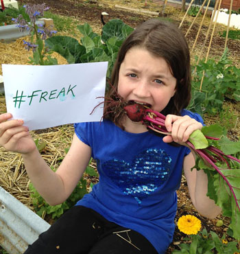 Sandra Porter posted a photo of her daughter in their veggie patch, on the Woolworths Facebook page. She said she would never shop at the store again.