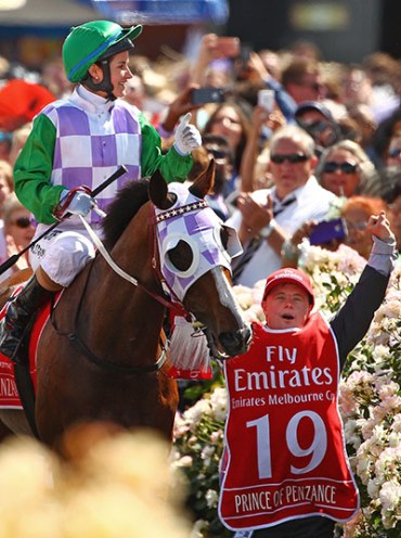 MELBOURNE, AUSTRALIA - NOVEMBER 03: Michelle Payne is congratulated by her brother Steven Payne, who has Down syndrome and works as a strapper after Michelle Payne riding Prince Of Penzance won race 7 the Emirates Melbourne Cup on Melbourne Cup Day at Flemington Racecourse on November 3, 2015 in Melbourne, Australia. (Photo by Scott Barbour/Getty Images)