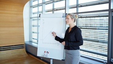 Businesswoman making a strategy presentation