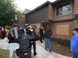 The exterior of Malik's home. 