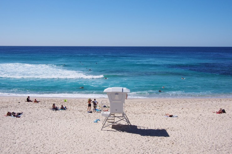 High Angle View Of People Relaxing At Bronte Beach Against Clear Blue Sky