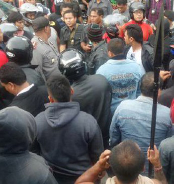 The heavily armed brawl spilled outside the jail.