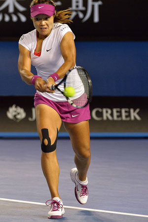 Li Na's knee tape could be an exhibit at the NGV. Photo: Getty