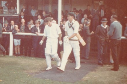 The author and Bill Lawry walk out to bat on day four, still with more than 100 runs to chase. Photo: supplied