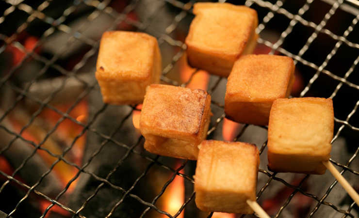 Tofu absorbs loads of flavour. Photo: Getty