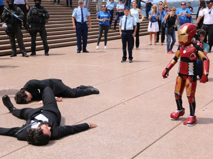 Iron Boy defeats two of Ultron's agents at the Opera House.
