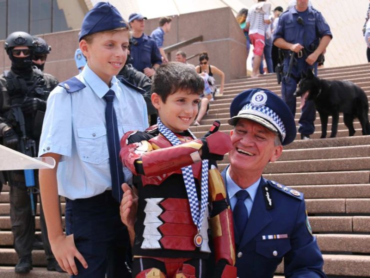 Iron Boy is awarded a medal of valour by NSW Police Commissioner Andrew Scipione.