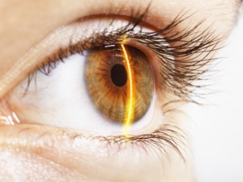 Extreme close up of laser scanning hazel eye