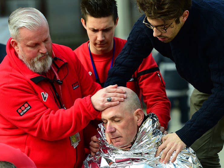 A victim receives first aid near Maalbeek metro station. Photo: Getty