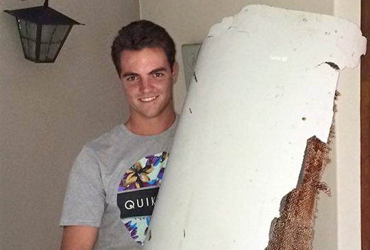 Mr Lotter with his beach find. Photo: Liam Lotter