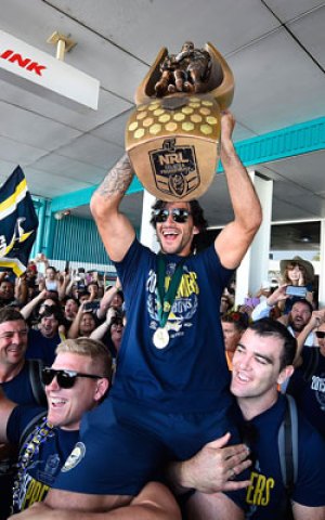 The King of Townsville: Johnathan Thurston celebrates last year's grand final triumph. Photo: Getty