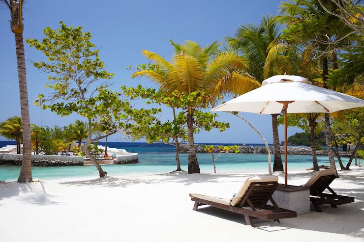 You can celebrity spot from the comfort of a lounge on Goldeneye's white-sand beach. Photo: Goldeneye