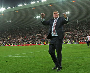 Sunderland manager Sam Allardyce celebrates on the pitch. Photo: Getty