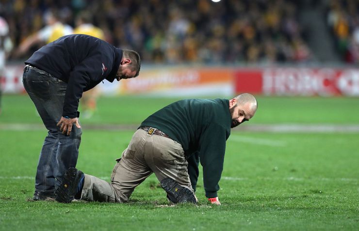 MELBOURNE, AUSTRALIA - JUNE 18: Groundsmen replace the loose divots after a scrum during the International Test match between the Australian Wallabies and England at AAMI Park on June 18, 2016 in Melbourne, Australia. (Photo by David Rogers/Getty Images)