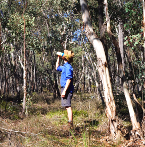 At one with nature: enjoying some Soylent in the bush.