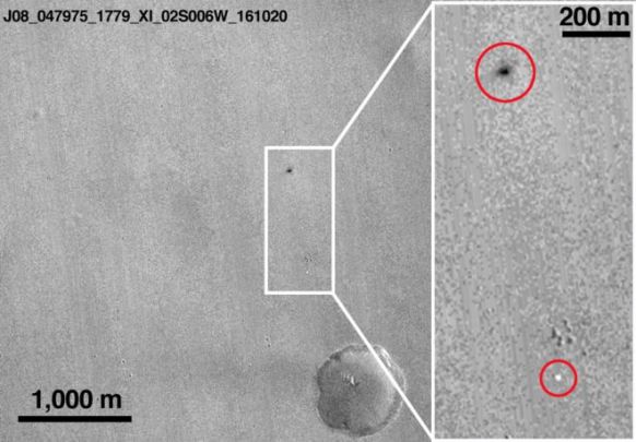 NASA images in May and October of the area of the Mars surface where the Schiaparelli lander was expected to set down. The black dot in the October image is believed to be where the lander ended up; the white dot is its parachute. 