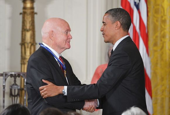 US President Barack Obama congratulates astronaut and former senator John Glenn after presenting him with the Presidential Medal of Freedom in 2012. Photo: Getty.
