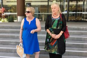 Bev Hogue (left), daughter of Audrey Manuel, with Carol Kelly-Moore, daughter of Ryan Kelly outside court.
