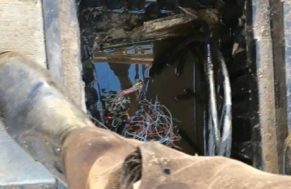 A tangle of copper wires in a puddle of stagnant water sums up the NBN, experts say 