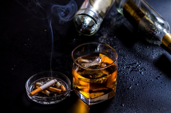 Stock image of cigarettes and alcohol