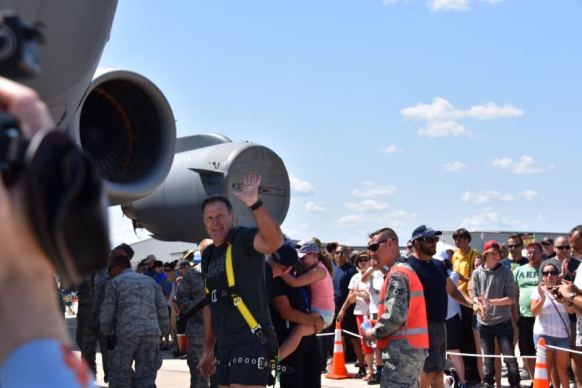 Grant Edwards waves to crowd