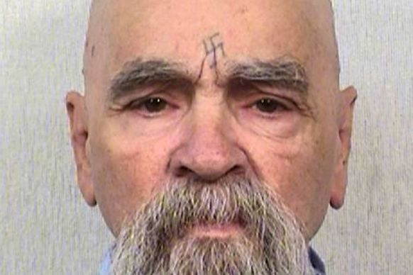 Charles Manson with swastika