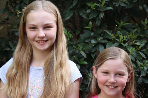 Sisters Sarah Johns, 11, and Becca Johns, 8, have had only positive experiences with sitters through the Gobi app.