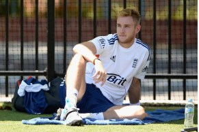 Stuart Broad takes a break during training.