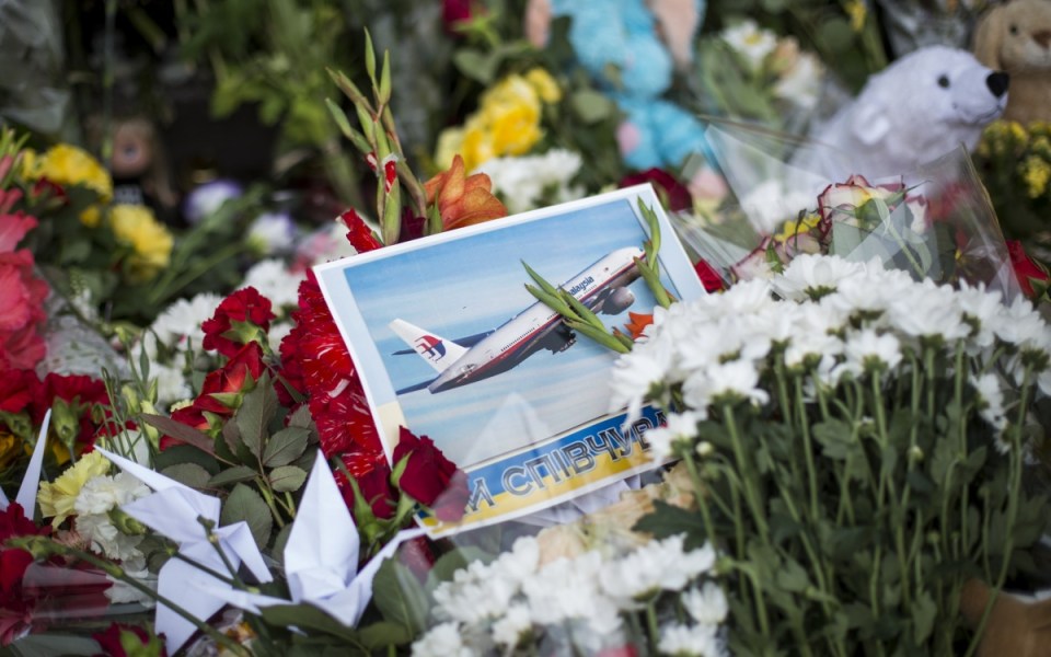 Tributes in front of the Netherlands Embassy in memory of the victims of flight MH17. Getty