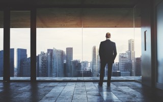 Business man in window