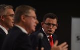 Opposition leader Daniel Andrews listens to Victorian premier Denis Napthine during a debate