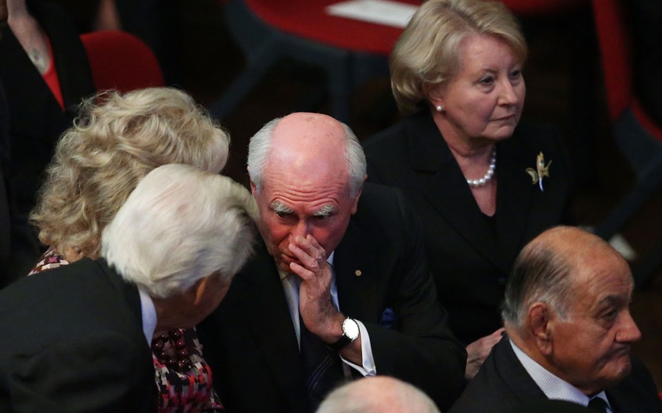 Former prime ministers John Howard and Bob Hawke speaking at the memorial.