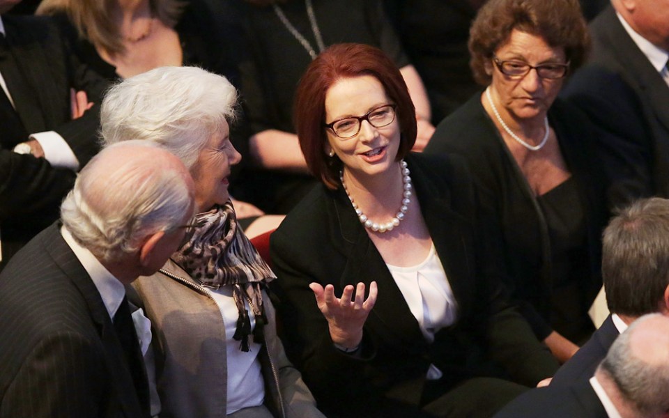 Julia Gillard speaking with former Prime Minister Malcolm Fraser inside the memorial.
