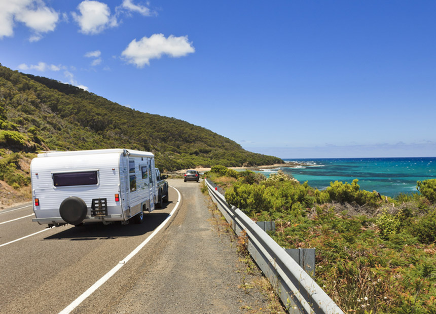 Coast drive car caravan road trip. Shutterstock
