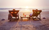 Retirment beach chairs sunset