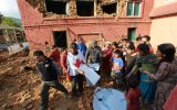 Red Cross distribute tarpaulins to displaced residents in Kathmandu.