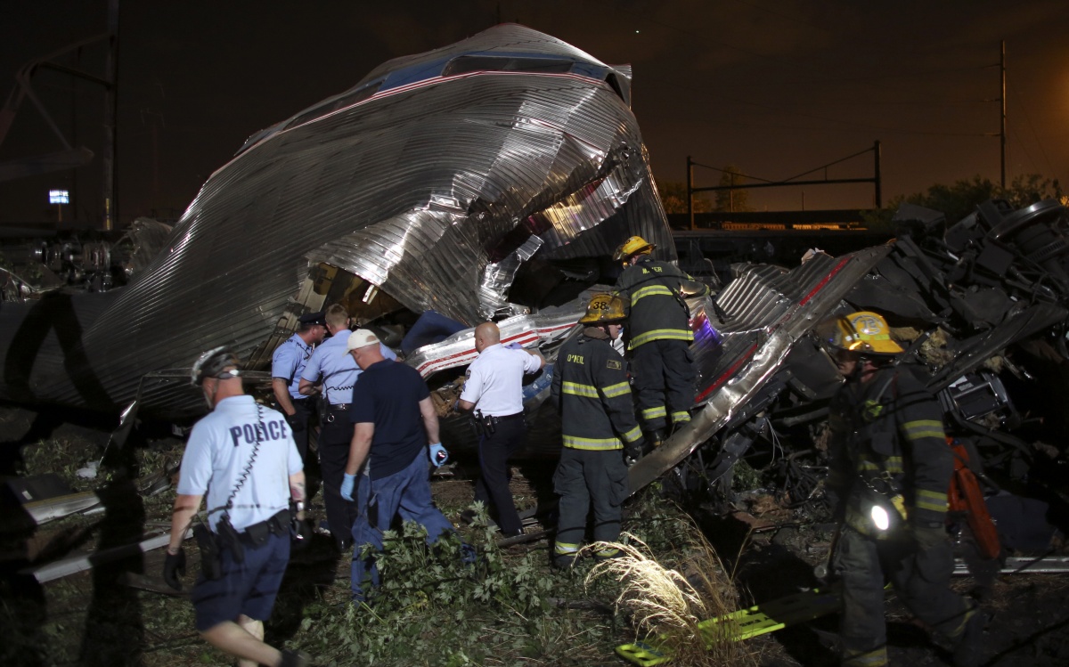 Emergency personnel work the scene of a train wreck, Philadelphia