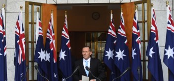 abbott-10-flags-260615-newdaily