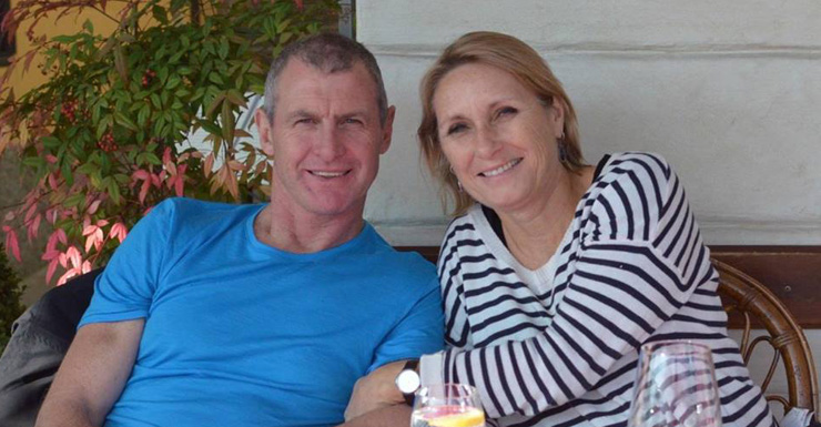 Murdered coach Phil Walsh and wife Meredith.
