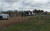 Police in Plumpton where two people were located deceased.