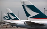 Cathay Pacific planes lined up at Hong Kong airport.