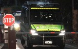 An ambulance leaves the Yongah Hill detention centre.