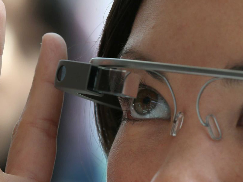 Google Glass allows users to access e-mail messages on its eye-level screen.