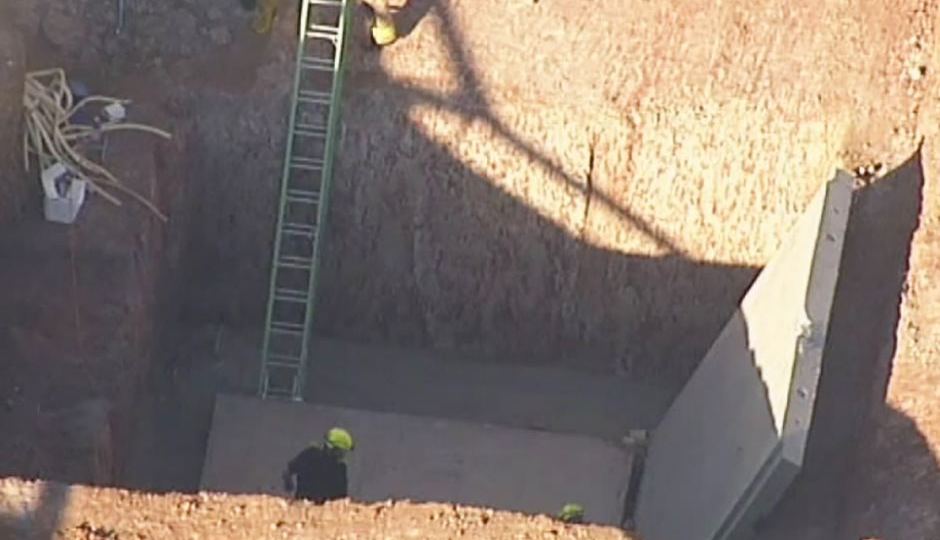 Men fatally crushed under concrete