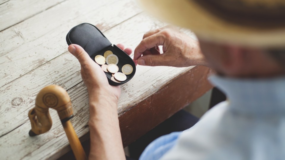 Old man with his wallet